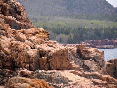 [Salmon colored granite rough-hewn from the weather.]